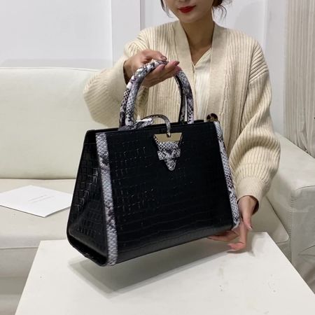 Fashionable snakeskin tote bag